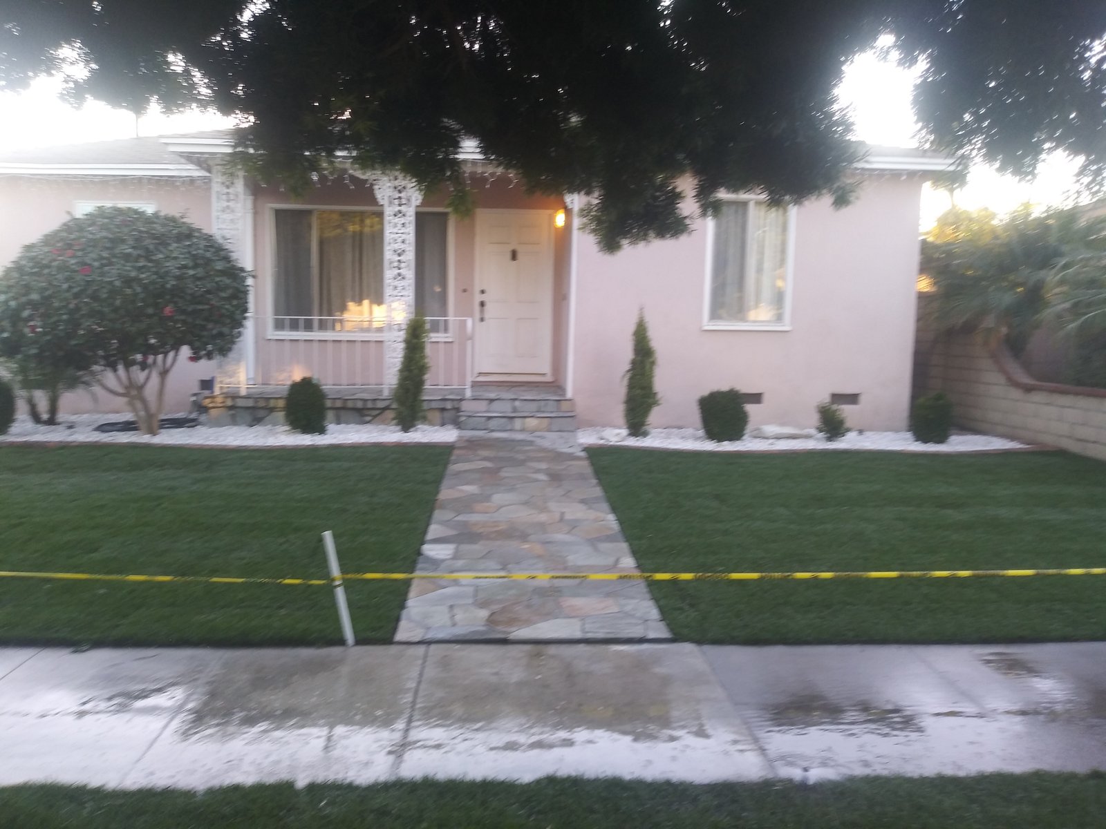 Front Yard Renovation with Flagstone Pathway, Paver Borders, White Gravel Beds, and marathon Sod